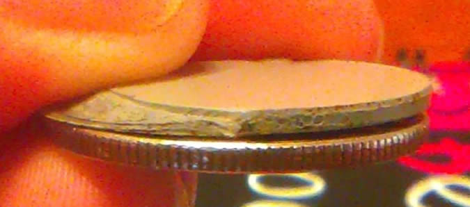 Nickel-Stuck-On-Quarter?